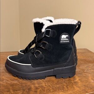 Sorel Black Winter Boots with White Trim.
